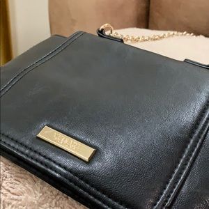 Black Versace perfumes bag